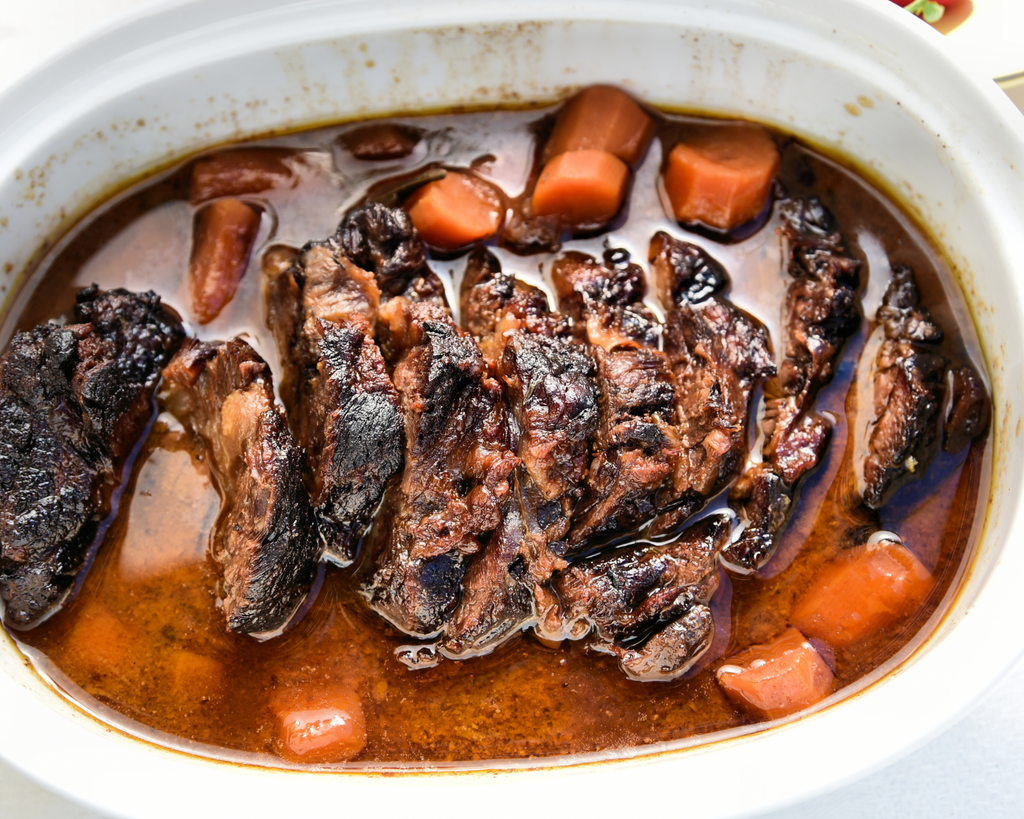 Slow cooked Beef Brisket with gravy and carrots